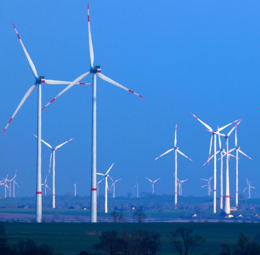 Wind turbines rotate in a wind farm in Mecklenburg-Western Pomerania.  Recently, the industry had to struggle with lulls